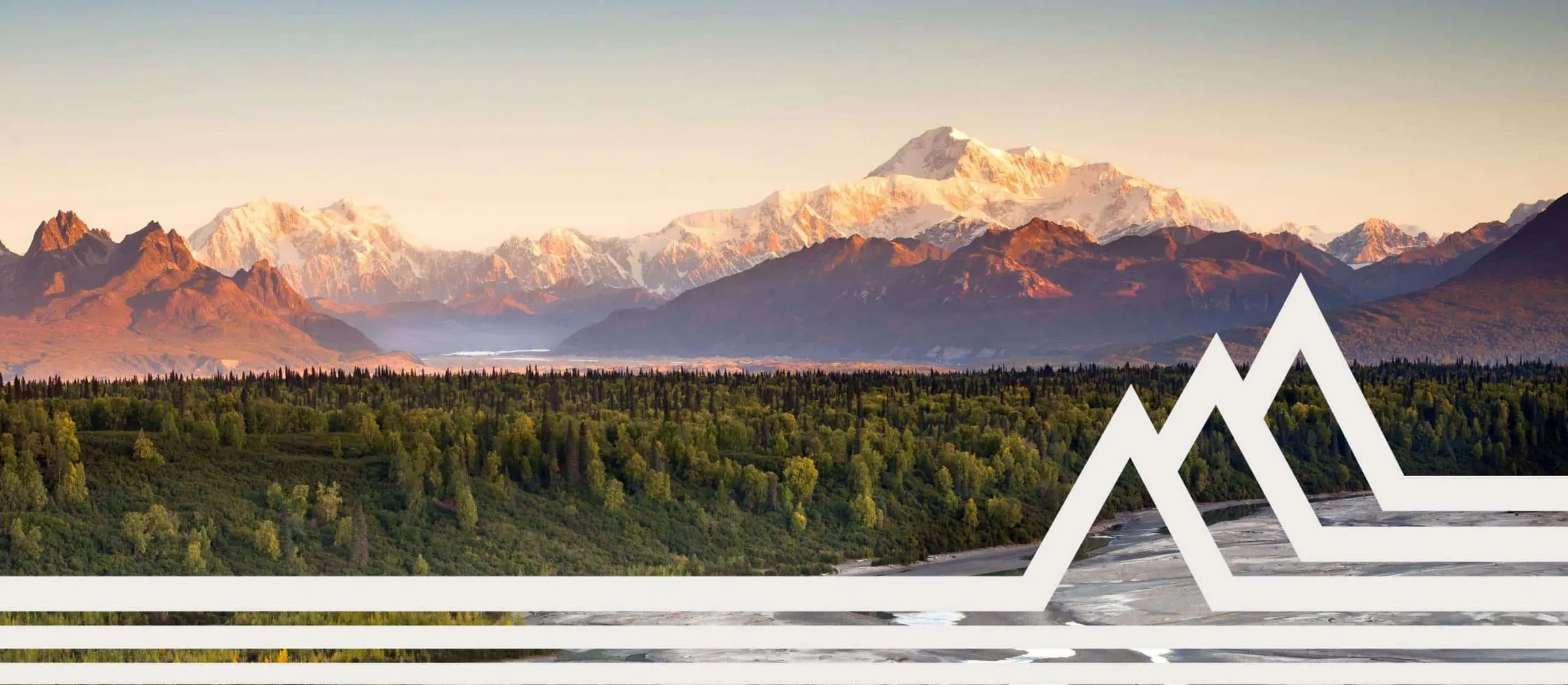 A snow-capped range above forest and a braided river at sunrise, with the Highland Vans mark overlaid